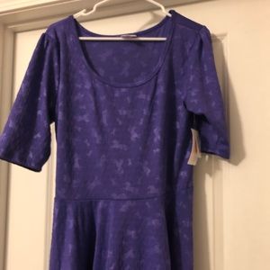 NWT LuLaRoe purple with unicorn design Nicole 2XL